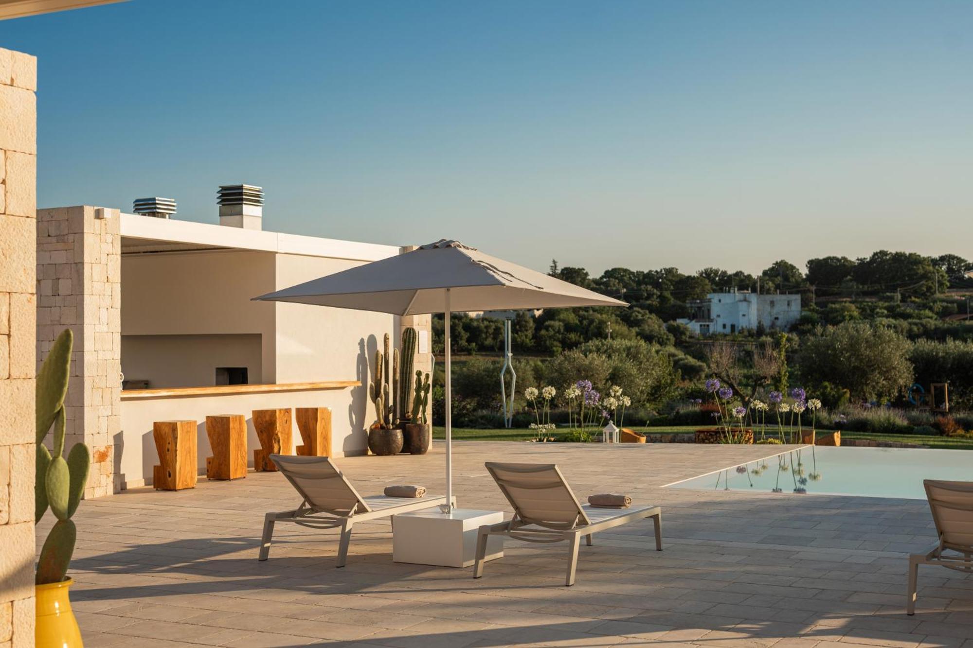 Essenza Relais Contemporaneo Bed & Breakfast Cisternino Bagian luar foto