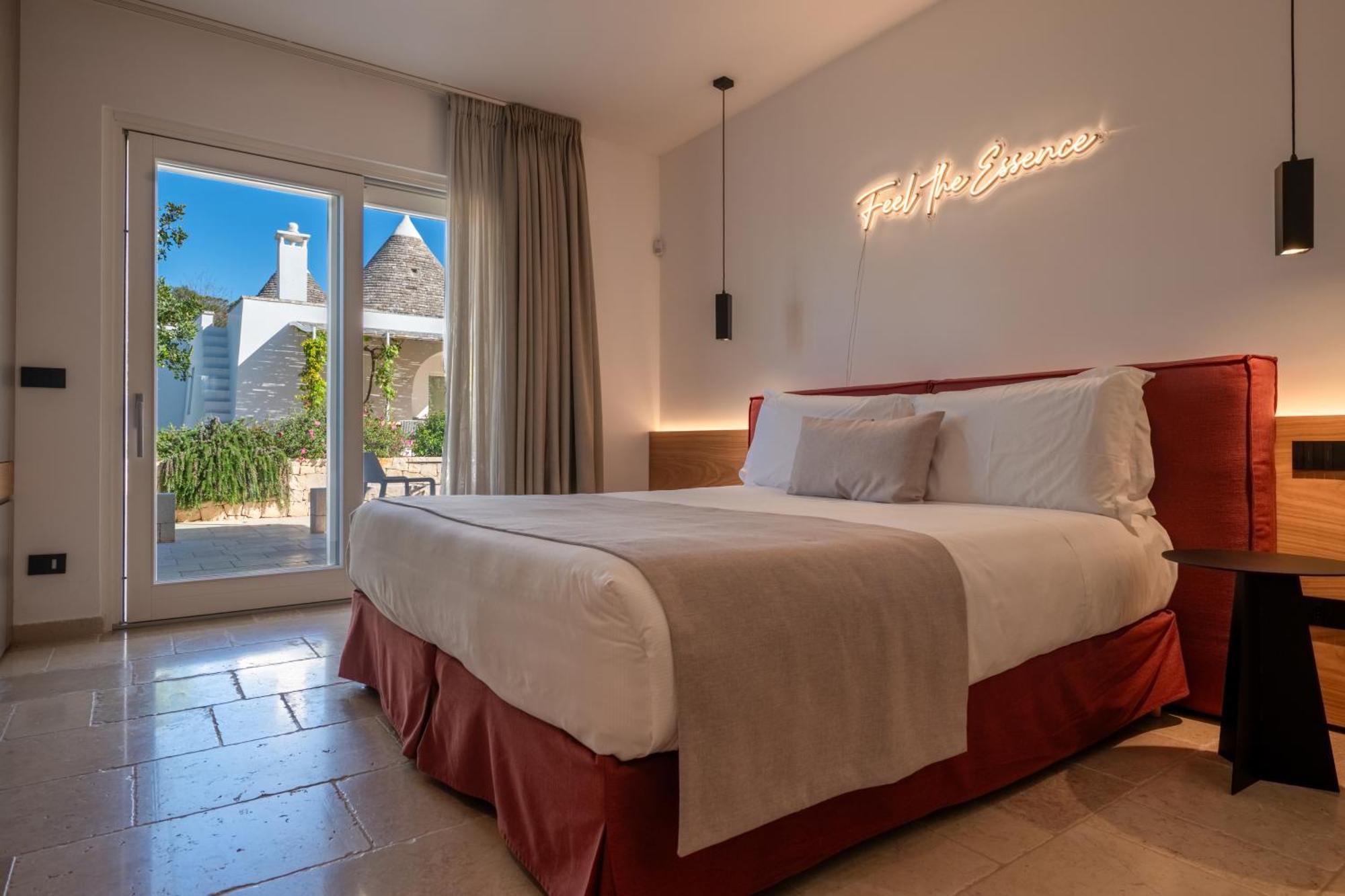 Essenza Relais Contemporaneo Bed & Breakfast Cisternino Bagian luar foto